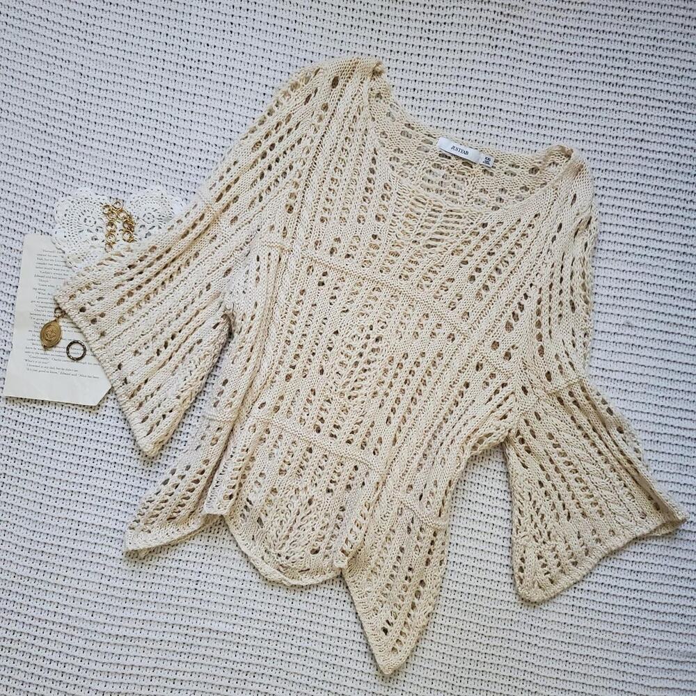 Cream crochet top with short bell sleeves